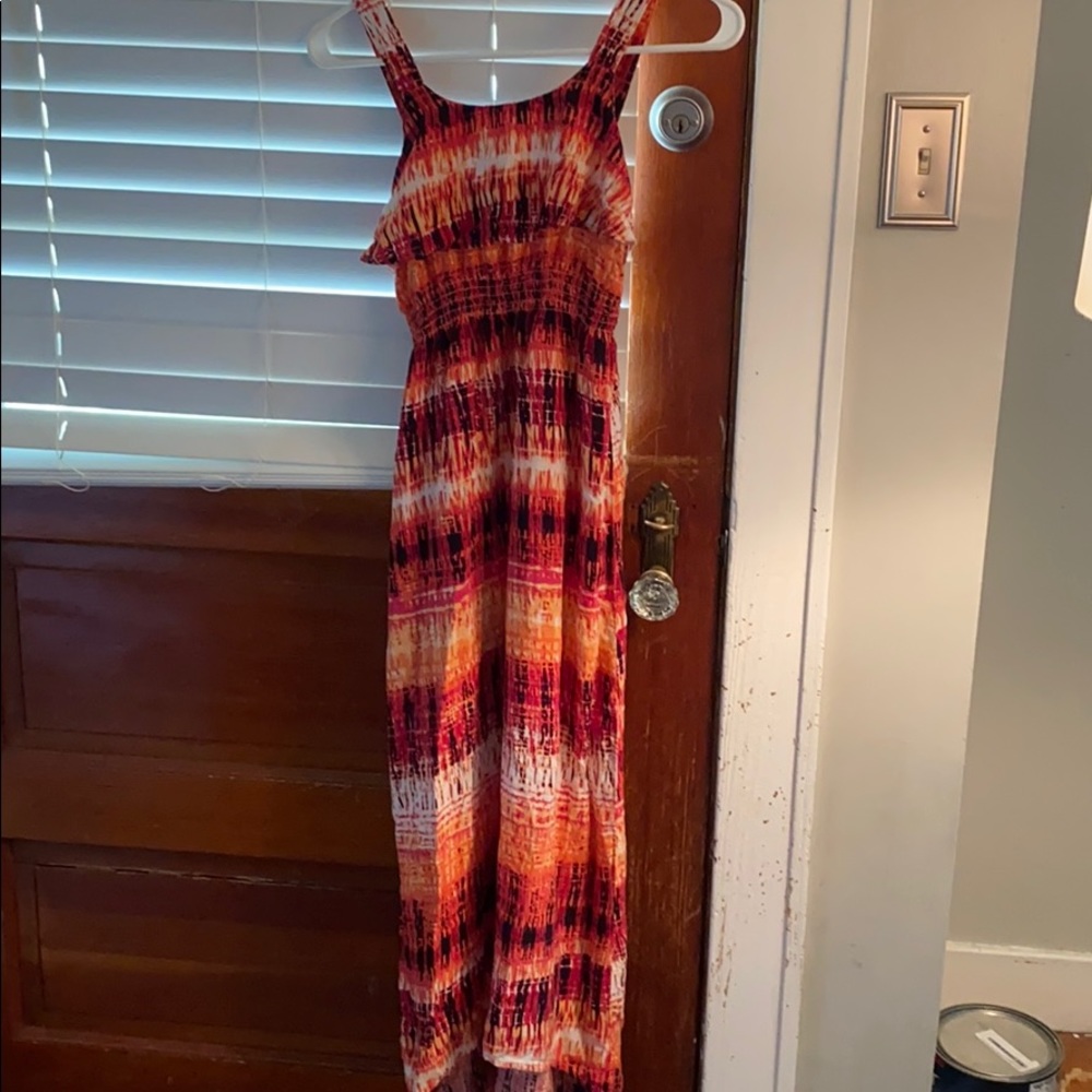 A red orange white black and pink dress